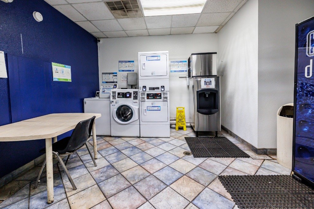 Guest laundry area with seating